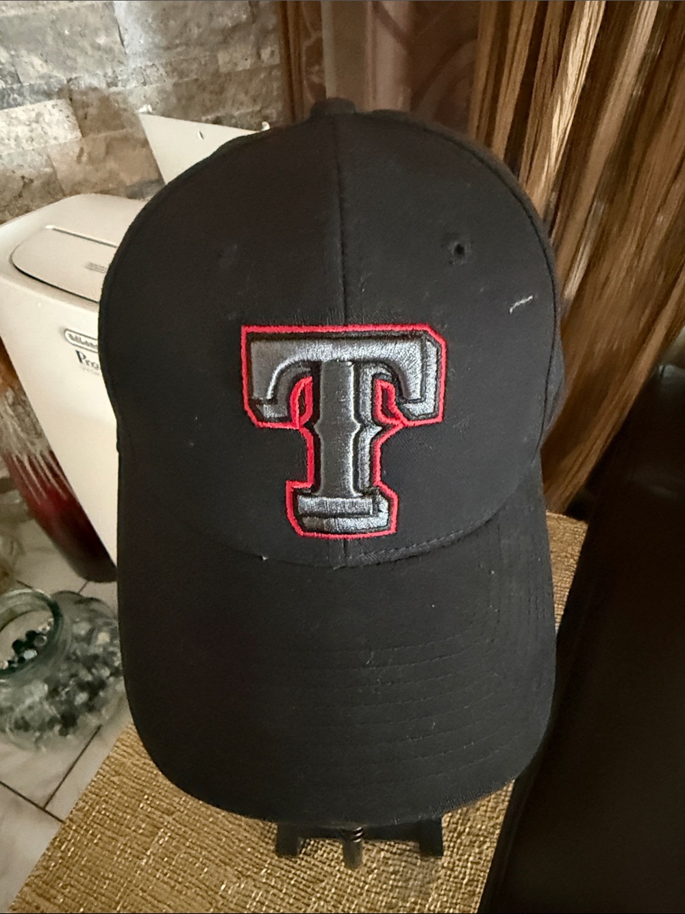 Black Baseball Cap with Embroidered 'T' Logo